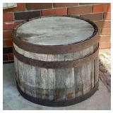 Half whiskey barrel planter.