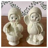 Pair of snow people figurines