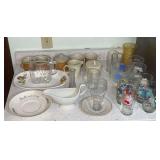 Assortment of glasses, cream and sugars, plates, etc.