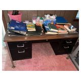 Metal desk with contents