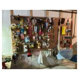 Wall of hardware, tape, masks, whisk broom