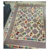 Vintage patchwork quilt, hand quilted, some stains and wear spots