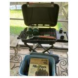 Range Master propane grill on stand with 2 propane bottles