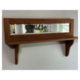 Wooden shelf with mirror