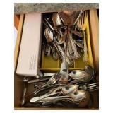 Assorted flatware and serving pieces