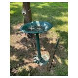 Plastic bird bath, rain gauge