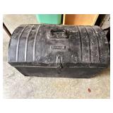 Metal trunk with hinged lid, "T. F. Busch" label