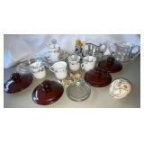 Cups and saucers, crock lids, creamer and sugar, etc.