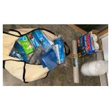 Log hauler bag with shelf liner, trash bags, etc.
