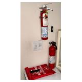 Pair of fire extinguishers and fire blanket