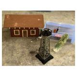Train depot, tower, street lamp, etc.