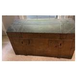 Wooden trunk with metal handles