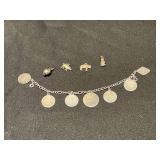 7" sterling charm bracelet (one charm marked sterling), sterling and 925 pendants