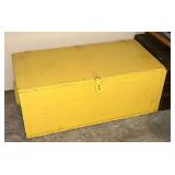 Yellow wooden box with hinged lid
