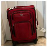 American Tourister 4-wheel luggage