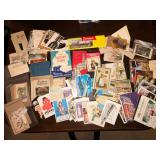 Nice assortment of vintage post cards with metal rack
