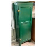 Green kitchen cabinet, back needs to be reattached