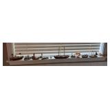 Small ship models and sea shells
