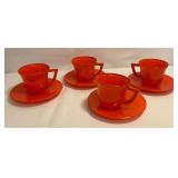 Set of 4 orange cups and saucers