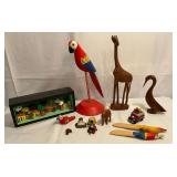 Wooden animal figurines, parrot, giraffe, stone turtle, etc.