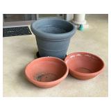 Oversize plastic flower pot, up to 20" T x 24" W.