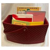 Leather handled basket, books