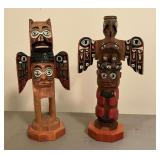 Pair of hand crafted totem poles, artist signed