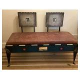 Creative metal bench with cushioned seat