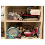 Paper and plastic bowls, decorating cake tips, candles, aluminum foil