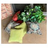 Patio pillows, basket of greenery.