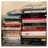 Stack of paperback and hardback books