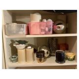 Assortment of candles and candle holders