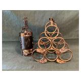 Metal wine bottle holder and decorative metal wine bottle