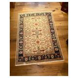 Area rug 70" x 47".