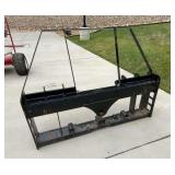 Wolverine skid steer quick attach frame