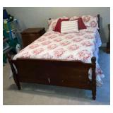Full size bed with linens, mattress and box springs