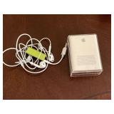 Apple iPod shuffle, ear buds.