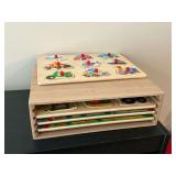 Wooden puzzles in storage box