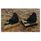 Pair of frog bookends, sitting on book