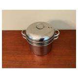Stainless steel stock pot, steamer and strainer.