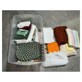 Pot holders, table linens, etc. in tote with lid