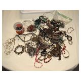 Costume jewelry, mostly necklaces