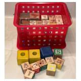 Plastic basket with wooden blocks