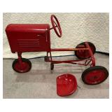 Red metal pedal tractor