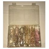 Necklaces and bracelets in organizer.