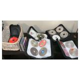 Collection of CDs in folders, no jackets