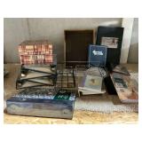 Metal decorative shelving, coat hooks, pewter sign, photo albums, etc.