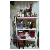 Plastic shelf and contents, Christmas decorations, tins, reindeer, candles, etc.