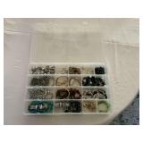 Necklaces and bracelets in organizer.