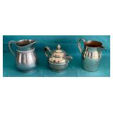 Pair of pitchers and teapot